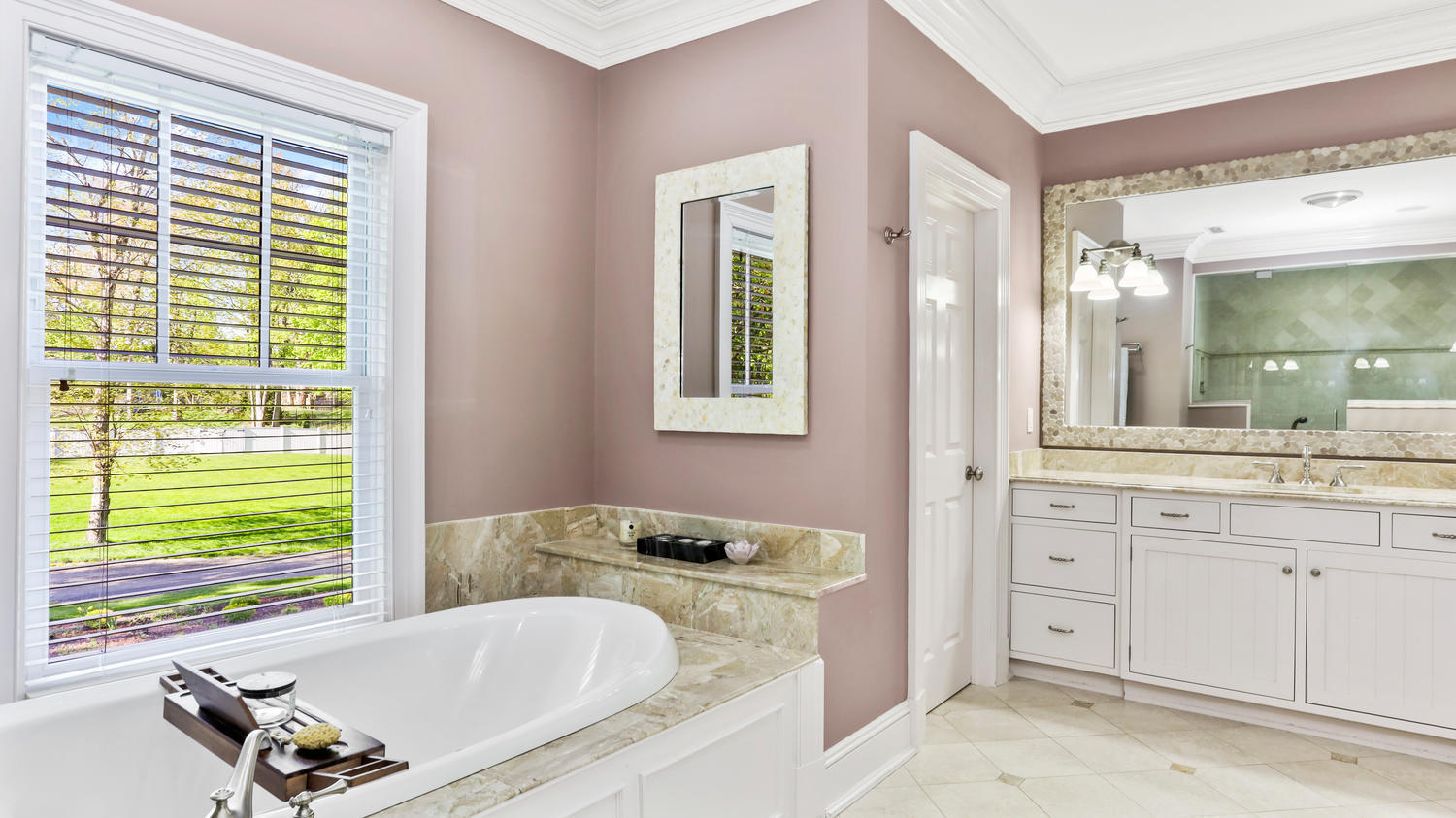 8 Wakeman Road Westport, CT 06880 - Photo 19 of 41 a bathroom with a tub sink and mirror