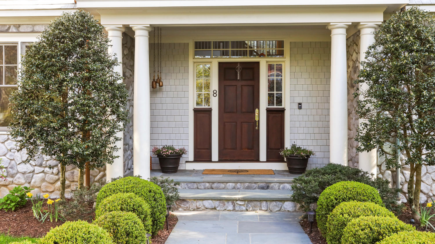 8 Wakeman Road Westport, CT 06880 - Photo 3 of 41 front view of a house with a yard