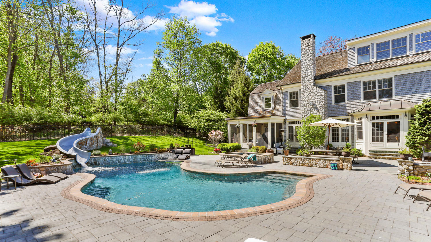 8 Wakeman Road Westport, CT 06880 - Photo 35 of 41 a view of a swimming pool with a patio