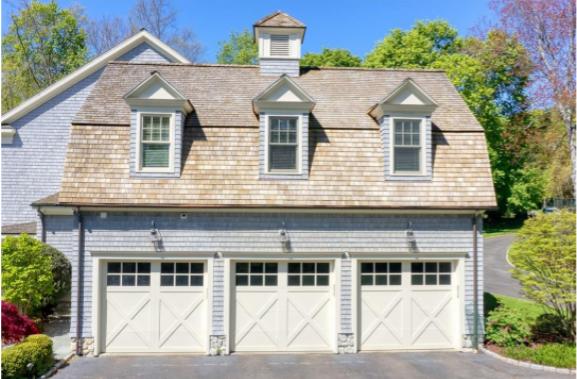 8 Wakeman Road Westport, CT 06880 - Photo 36 of 41 a view of a brick house with large windows
