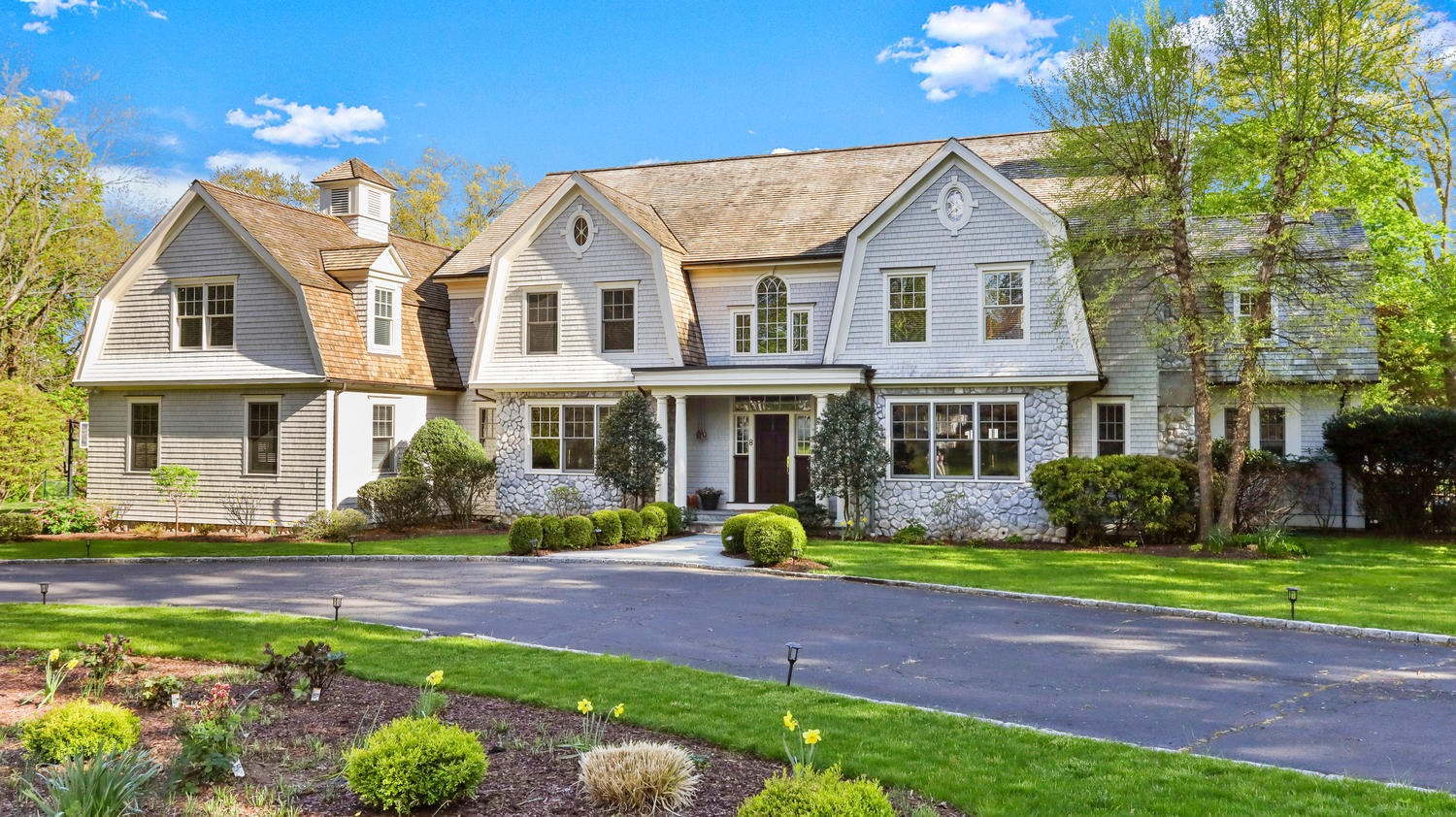 8 Wakeman Road Westport, CT 06880 - Photo 37 of 41 a front view of a house with garden and porch