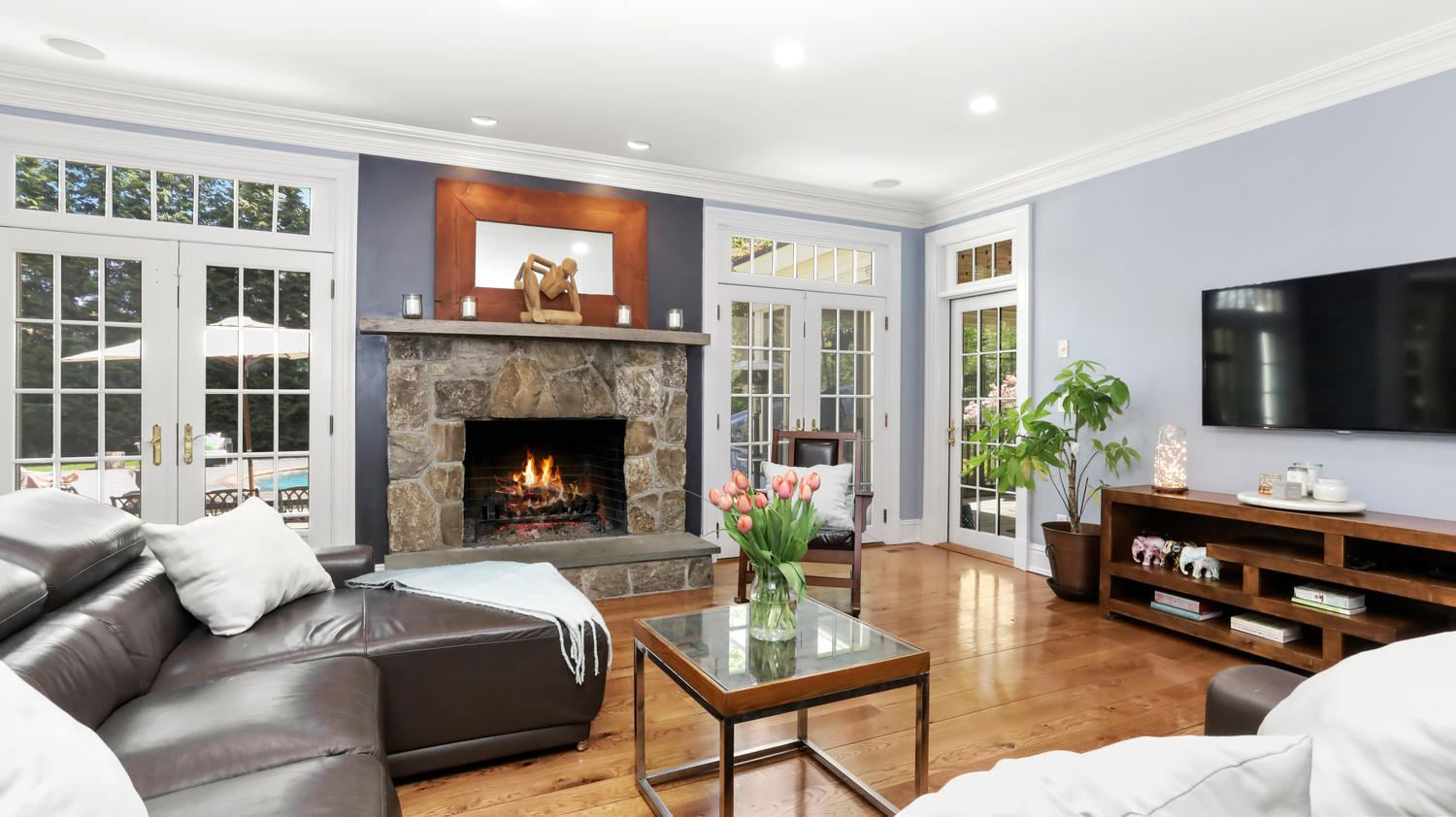 8 Wakeman Road Westport, CT 06880 - Photo 5 of 41 a living room with furniture fireplace and a flat screen tv