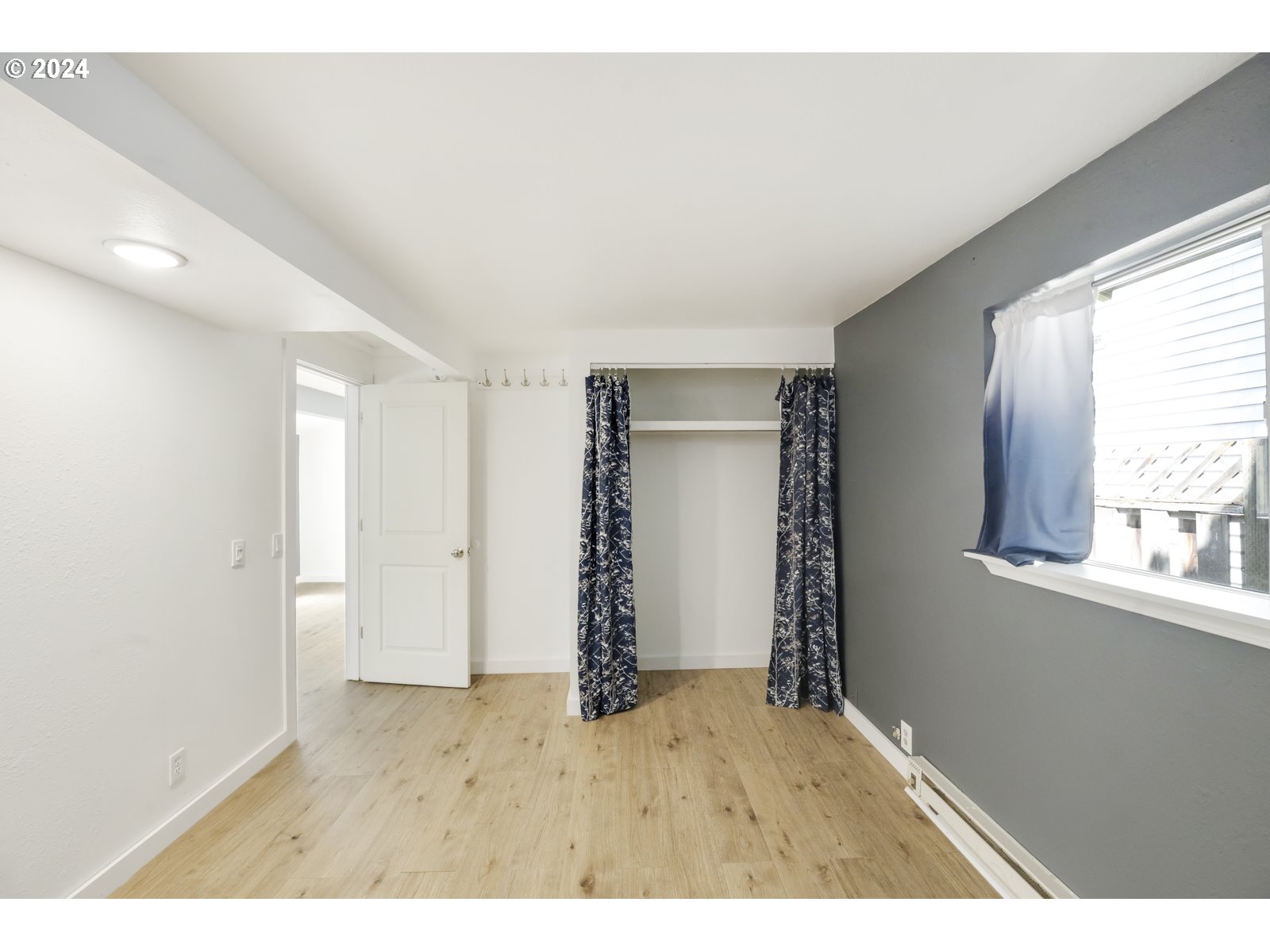 604 Northeast 93rd Avenue Portland, OR 97220 - Photo 11 of 34 a view interior of a house and an entryway