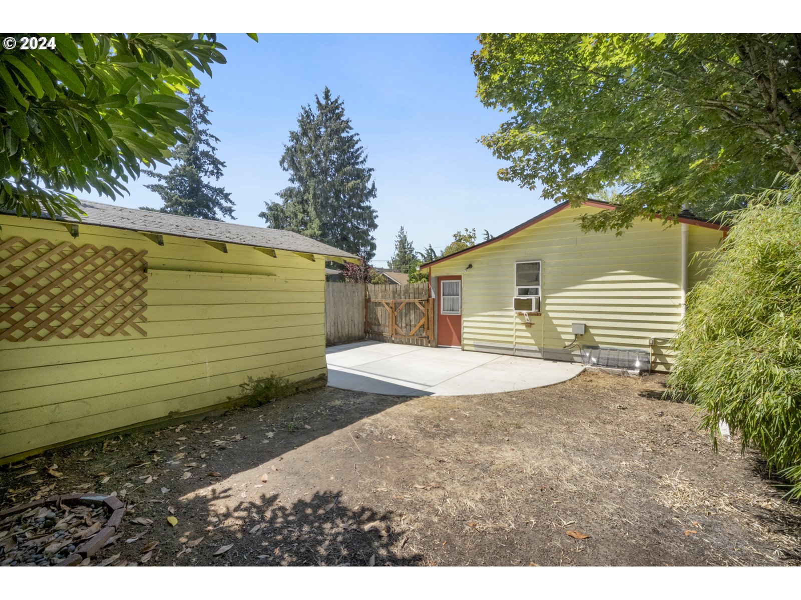 604 Northeast 93rd Avenue Portland, OR 97220 - Photo 28 of 34 a view of a backyard of the house