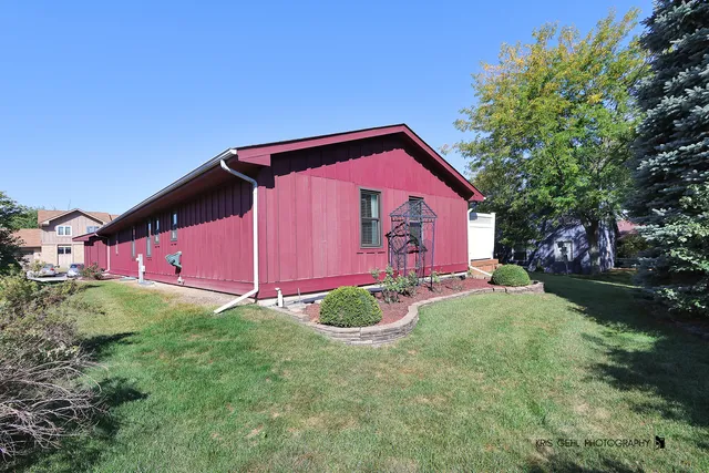 a view of a backyard with garden