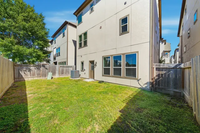 a view of front door of house with yard