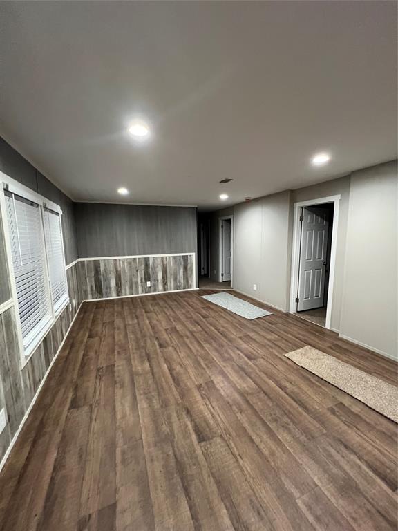 197 Sweden Street Walnut Springs, TX 76690 - Photo 12 of 27 a view of empty room with wooden floor