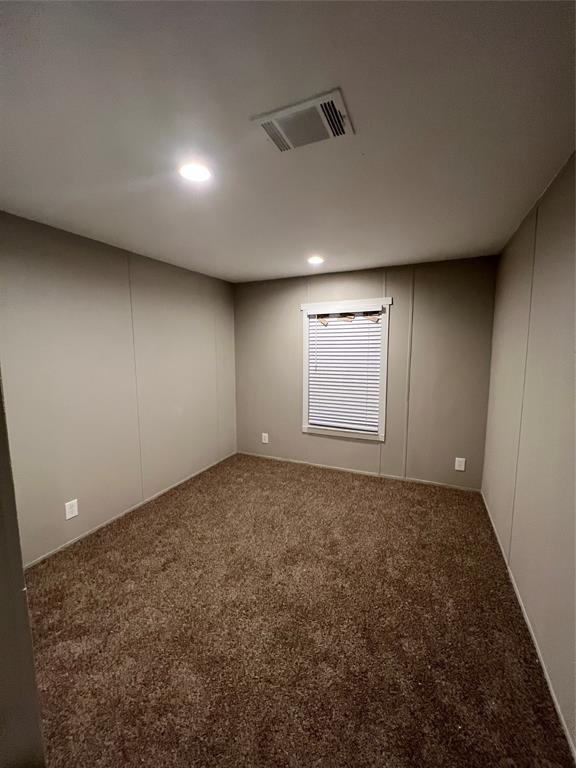 197 Sweden Street Walnut Springs, TX 76690 - Photo 16 of 27 an empty room with windows