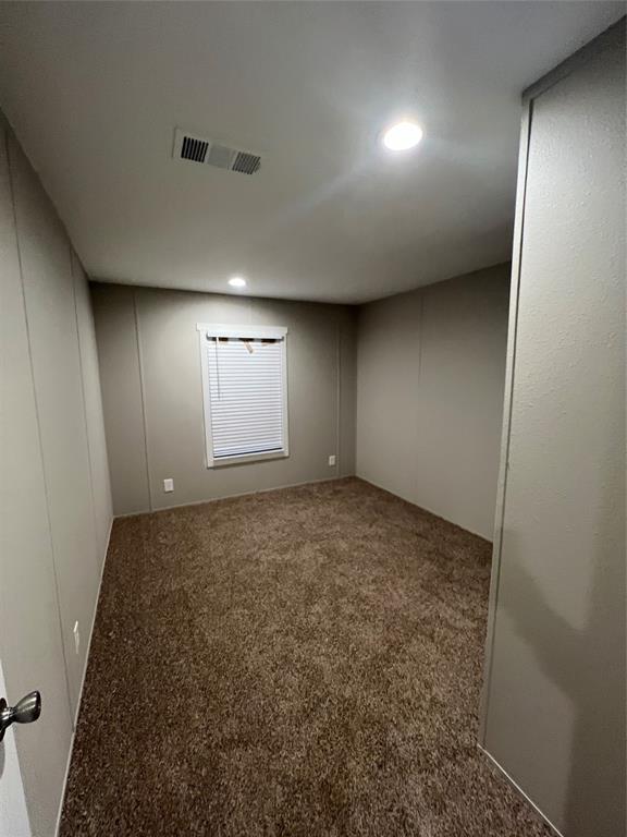 197 Sweden Street Walnut Springs, TX 76690 - Photo 20 of 27 an empty room with a natural light