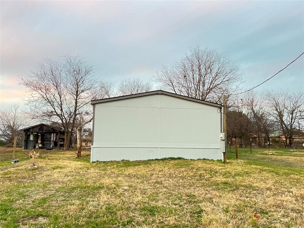 197 Sweden Street Walnut Springs, TX 76690 - Photo 5 of 27 a view of outdoor space with garden