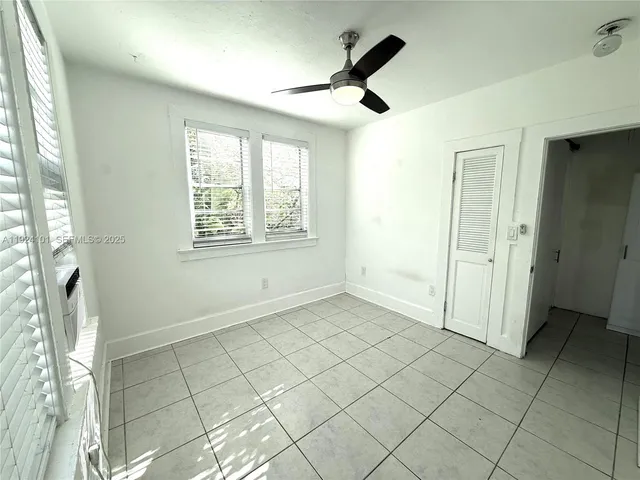 a view of an empty room and window