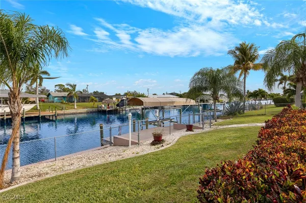 a view of a swimming pool with a lake view