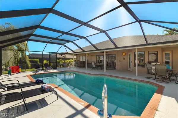 a patio with garden area and patio