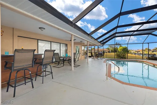 a view of a livingroom with chairs