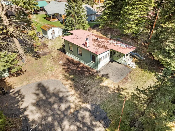 an aerial view of residential house with outdoor space