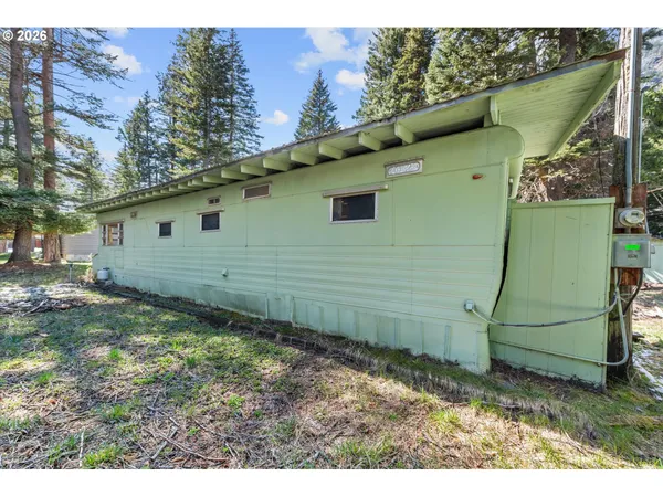 a house view with a outdoor space