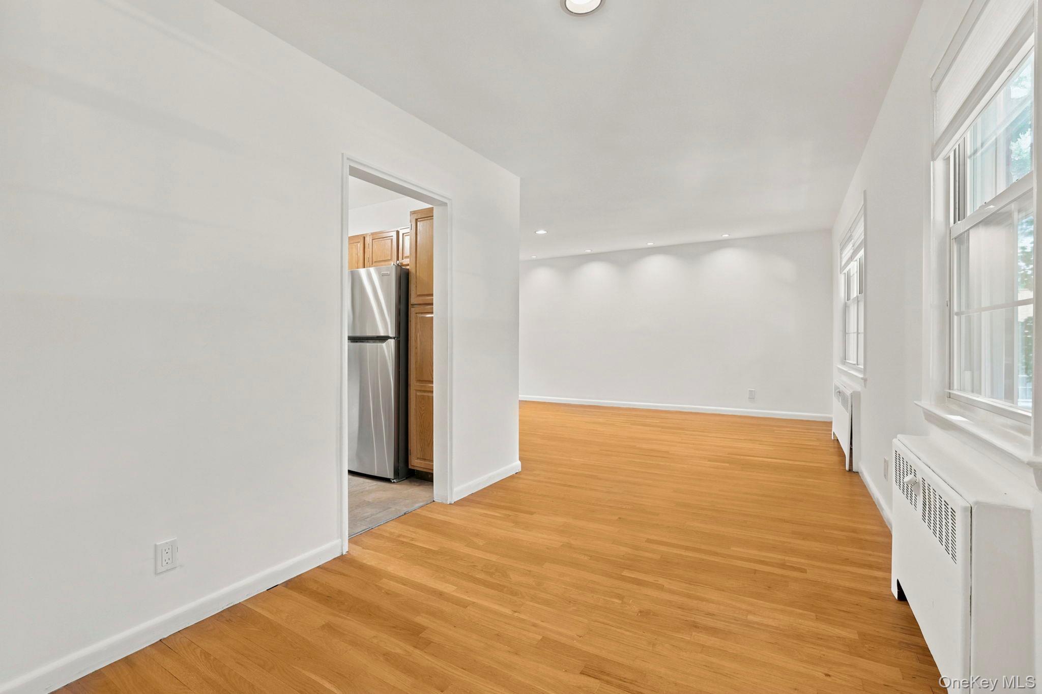 186 Pinewood Road, Unit 56 Hartsdale, NY 10530 - Photo 14 of 29 Here is another view of the dining area with the living room beyond, and a peek into the kitchen