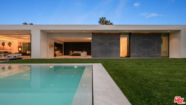 a view of a house with a swimming pool