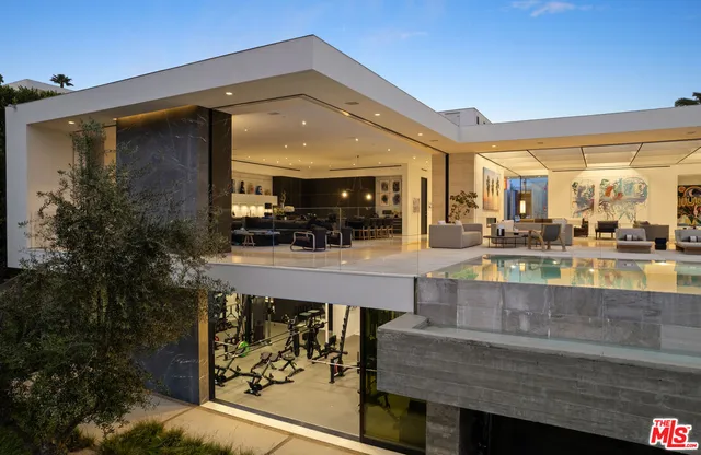 a view of living room and kitchen with furniture