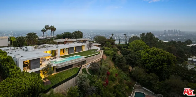a view of a balcony with chairs