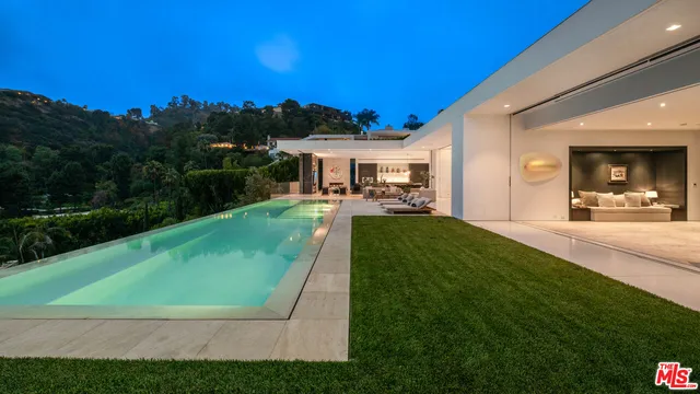 a view of a backyard of the house