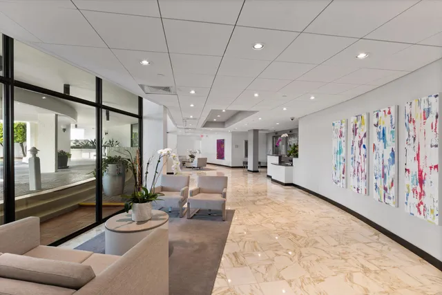 a view of a swimming pool and an ocean view