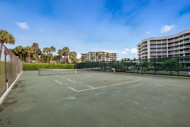 a view of a swimming pool with a lounge chairs