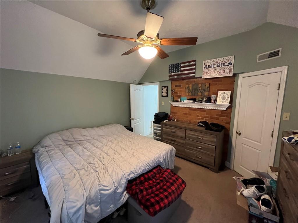 391 Webster Street Rochester, PA 15074 - Photo 8 of 20 a bedroom with a bed and a dresser