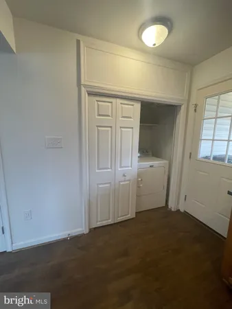 an empty room with a bathroom
