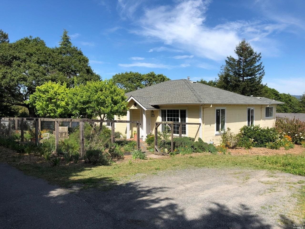 5286 McFarlane Road Sebastopol, CA 95472 - Photo 1 of 1 a front view of a house with a yard