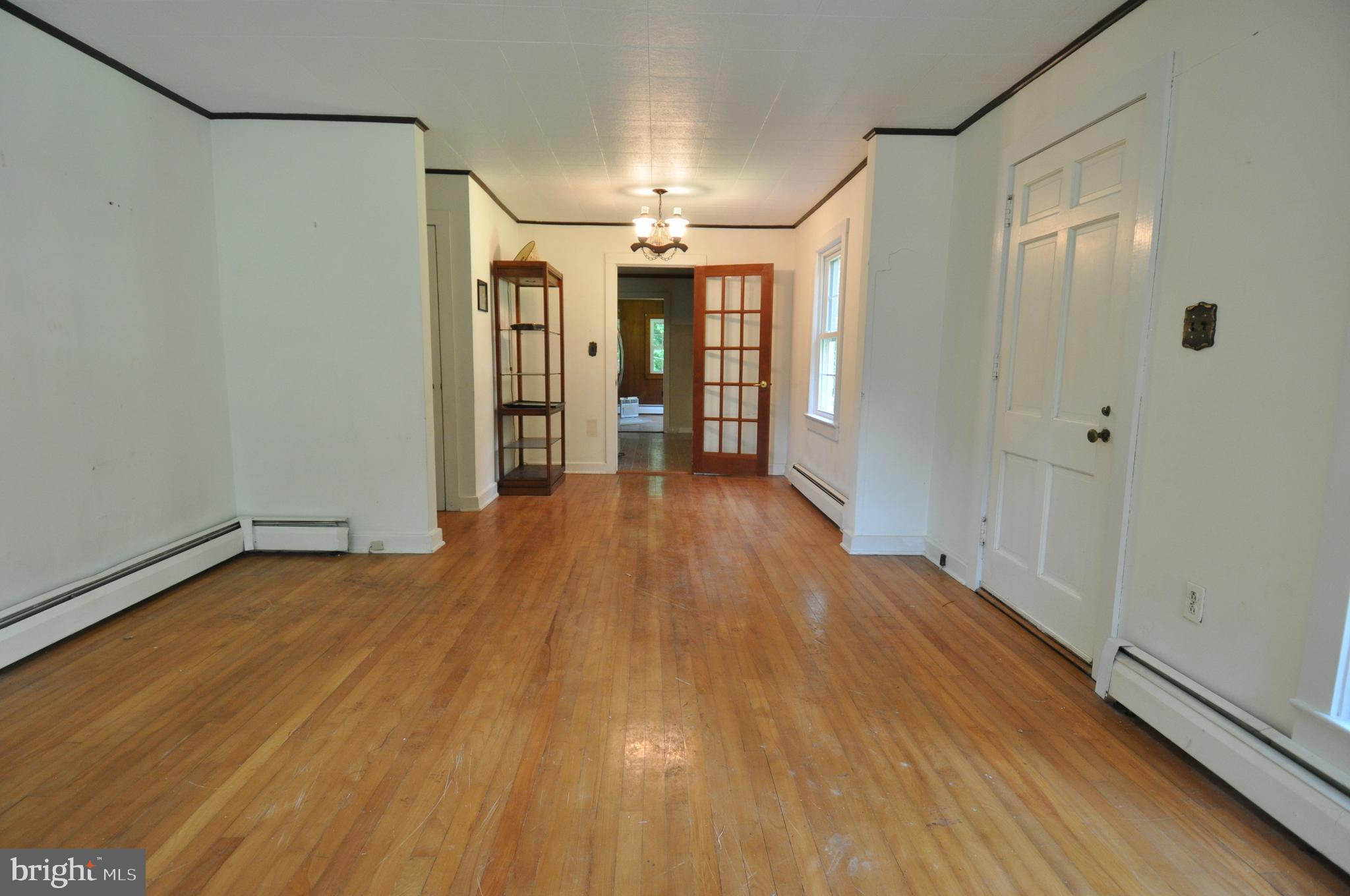 635 Cedar Hall Road Pocomoke City, MD 21851 - Photo 11 of 48 a view of a hallway with wooden floor