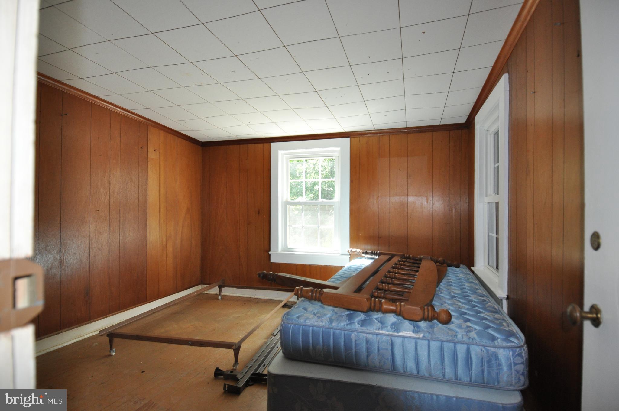 635 Cedar Hall Road Pocomoke City, MD 21851 - Photo 28 of 48 a bedroom with a bed and a window