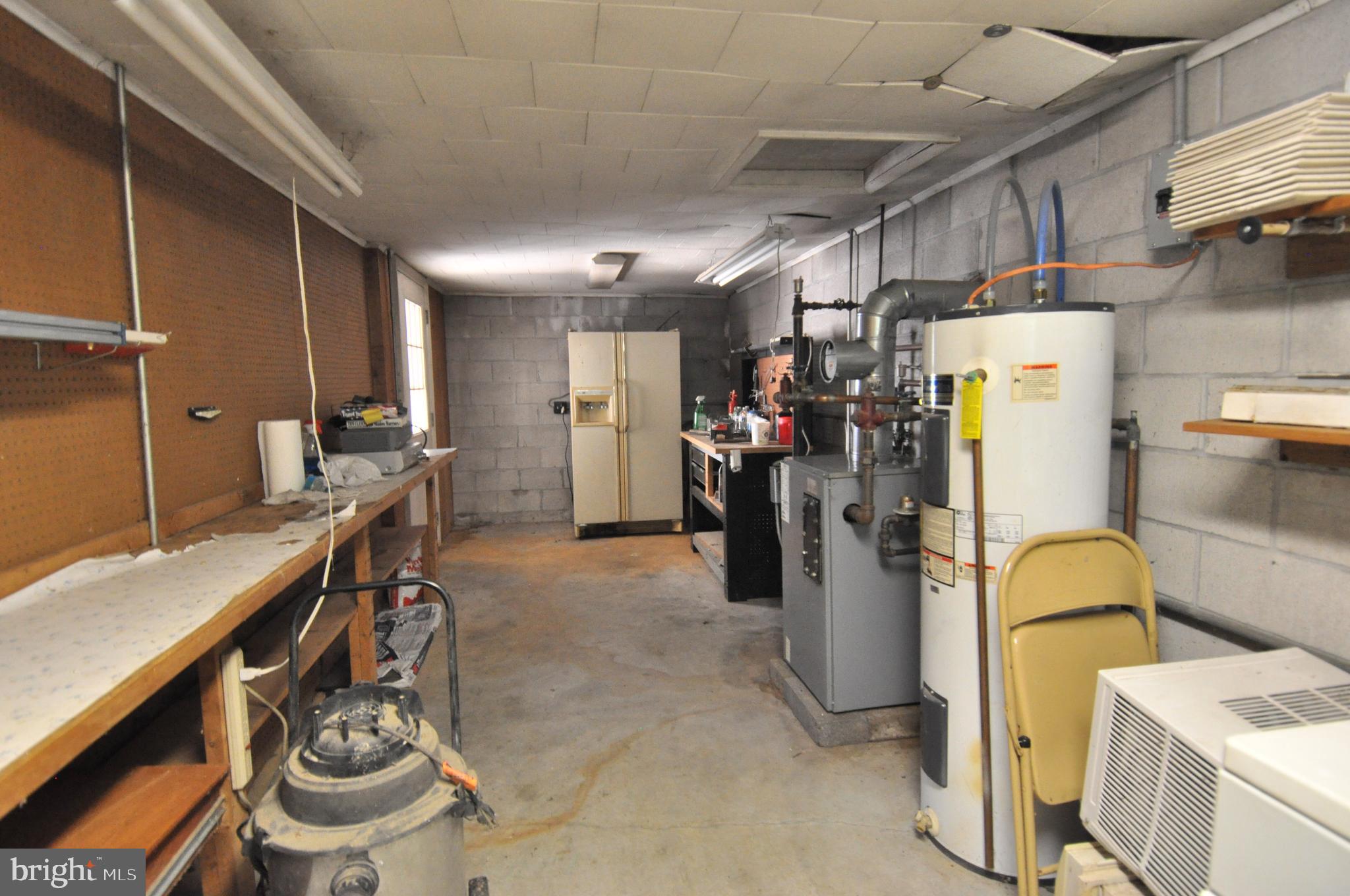 635 Cedar Hall Road Pocomoke City, MD 21851 - Photo 41 of 48 a view of a room with gym equipment