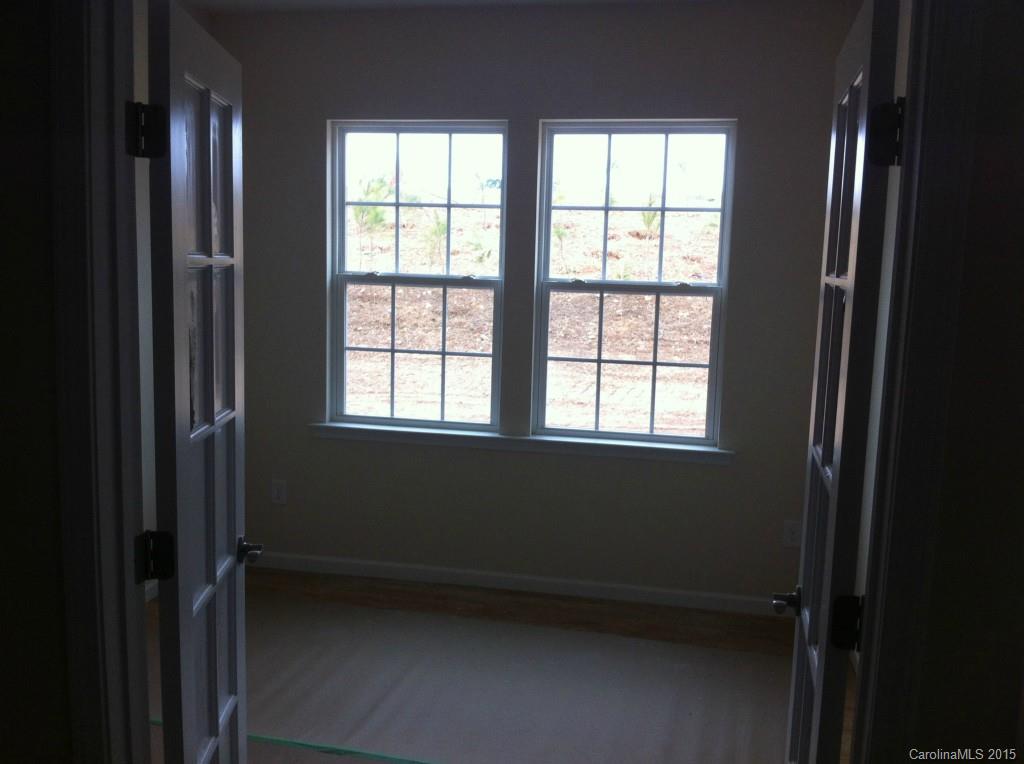 4250 Perth Road, Unit 307 Indian Land, SC 29707 - Photo 6 of 12 a view of an empty room with a window