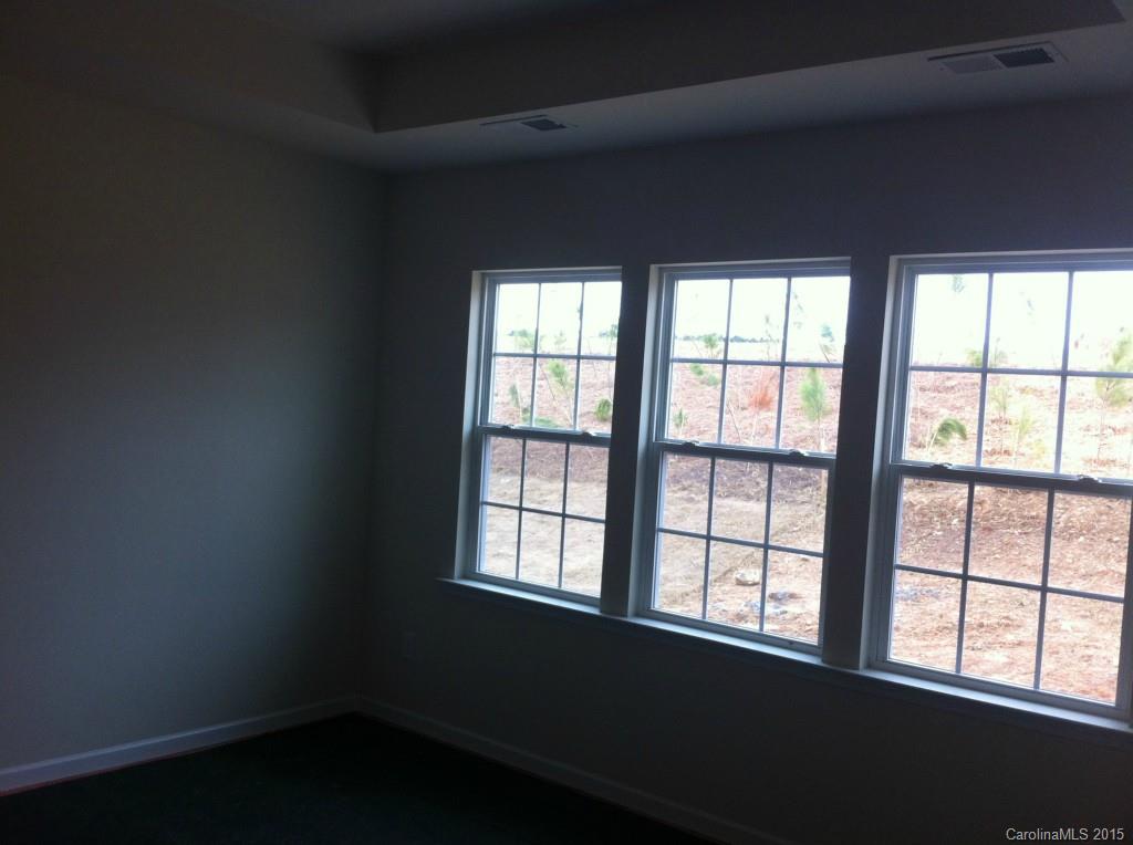4250 Perth Road, Unit 307 Indian Land, SC 29707 - Photo 8 of 12 an empty room with a window