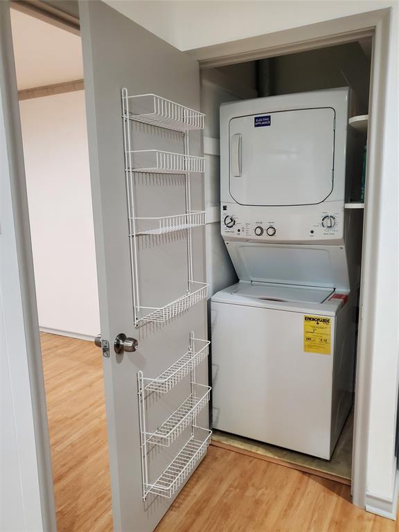 7424 Walling Lane Dallas, TX 75231 - Photo 18 of 19 a utility room with dryer and washer
