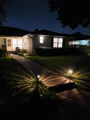 a view of a porch and a yard