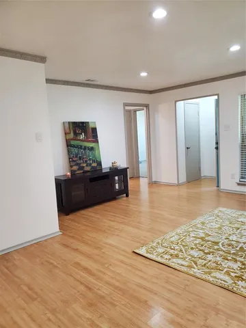 a view of kitchen with wooden floor