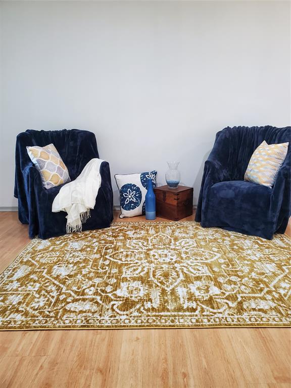 7424 Walling Lane Dallas, TX 75231 - Photo 6 of 19 a living room with a couch and a couch