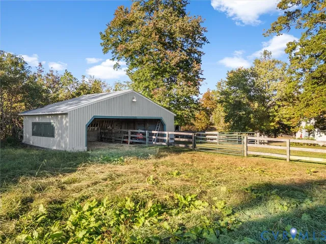 a bathroom with a tub and a window