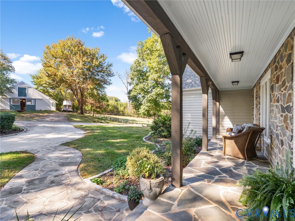 2575 Maidens Road Maidens, VA 23102 - Photo 15 of 50 a view of backyard with seating area and trees
