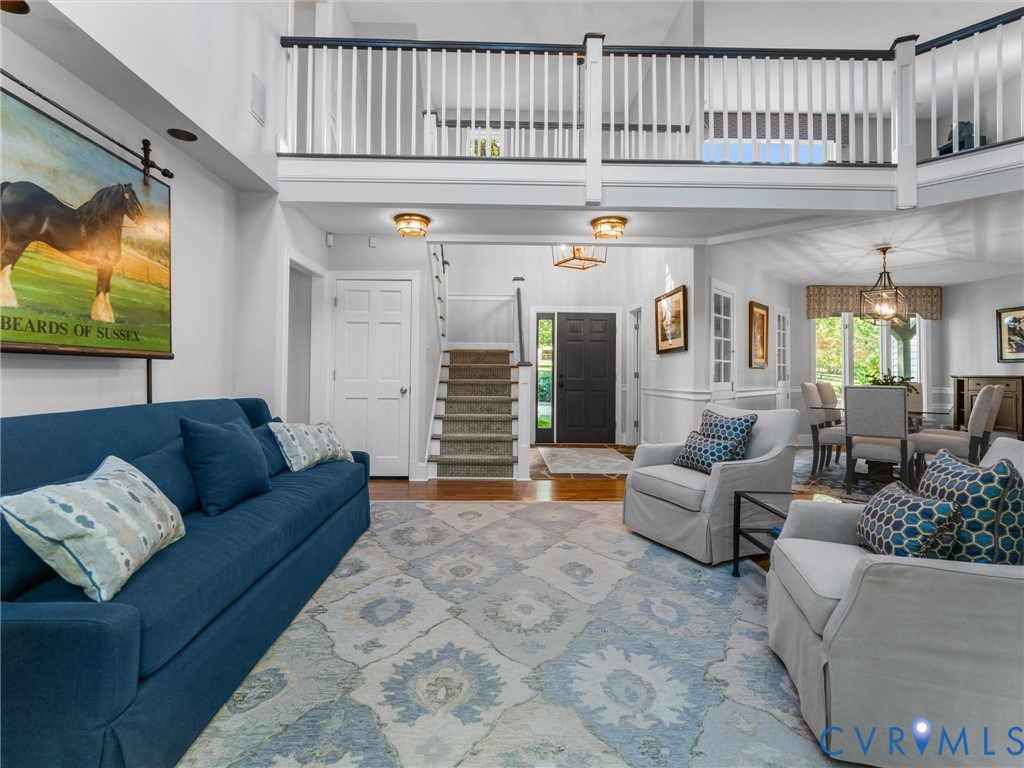 2575 Maidens Road Maidens, VA 23102 - Photo 17 of 50 a living room with furniture and a flat screen tv