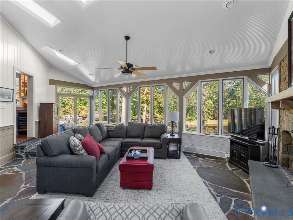 2575 Maidens Road Maidens, VA 23102 - Photo 28 of 50 a living room with furniture and a flat screen tv