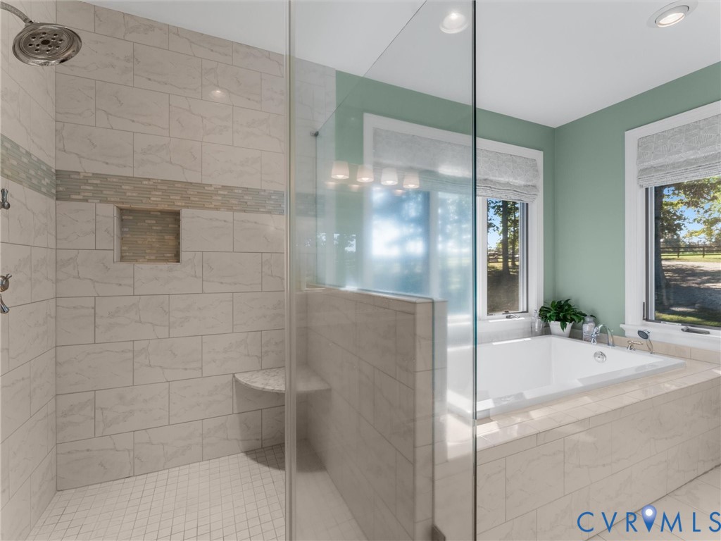 2575 Maidens Road Maidens, VA 23102 - Photo 32 of 50 a bathroom with a bathtub and a shower