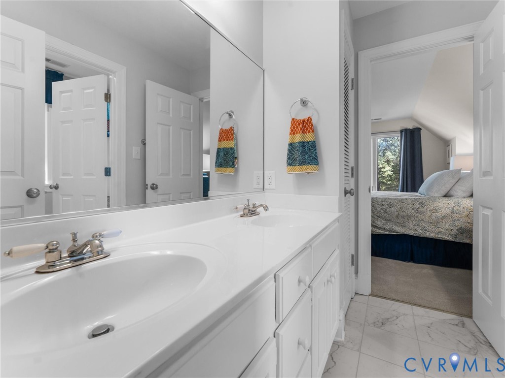 2575 Maidens Road Maidens, VA 23102 - Photo 39 of 50 a en suite bathroom with double sink and a mirror