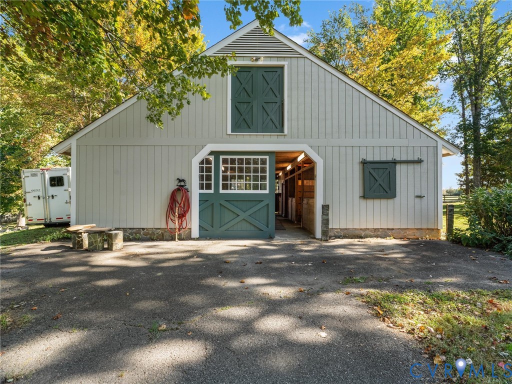 2575 Maidens Road Maidens, VA 23102 - Photo 9 of 50 a front view of a house with a yard