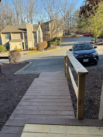 a view of a patio with a table and chairs