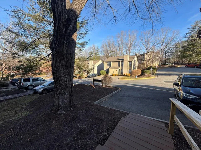 a view of street with sitting area