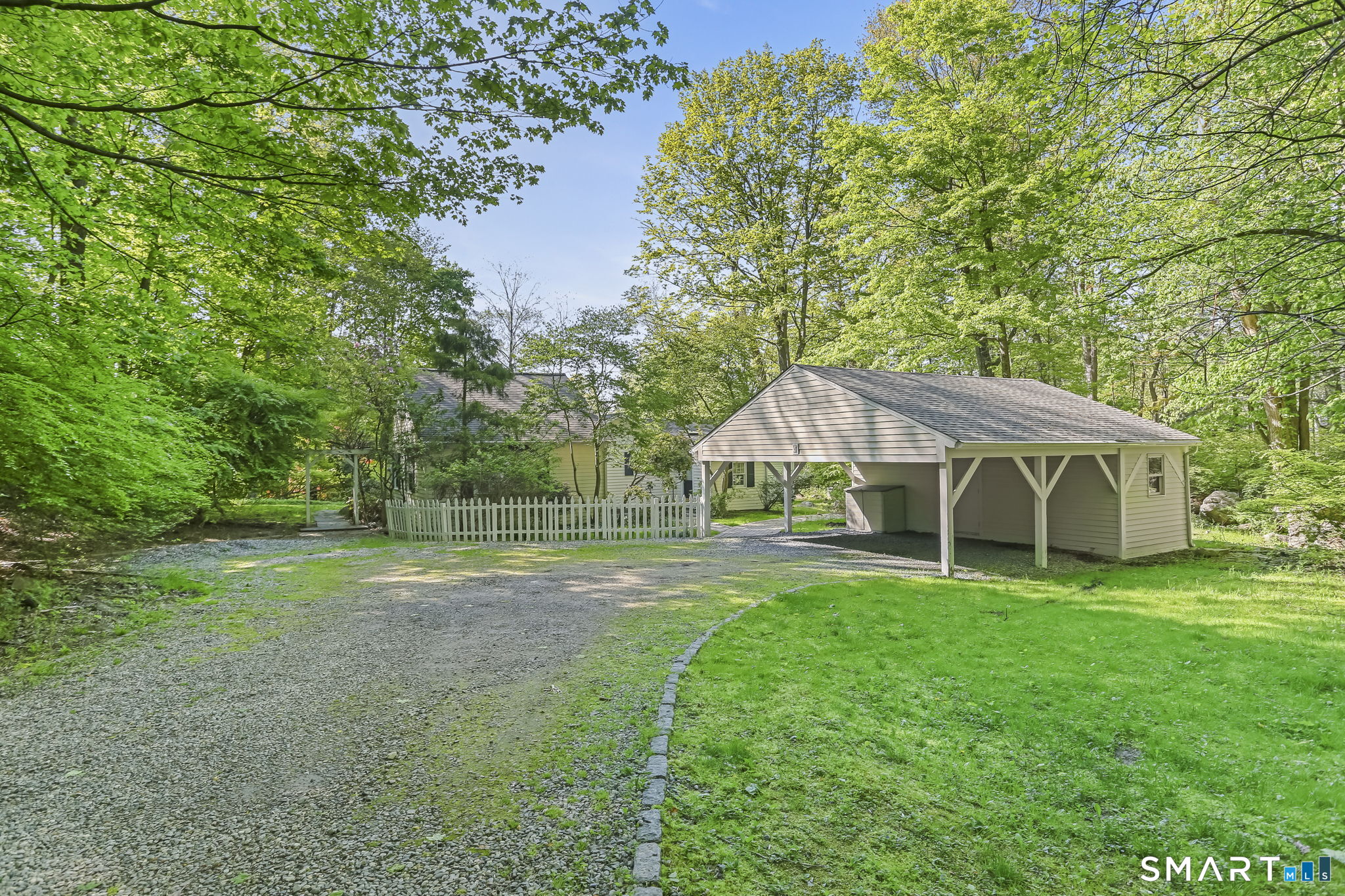 4 Topping Lane Norwalk, CT 06854 - Photo 28 of 30 a view of a house with a yard and sitting area