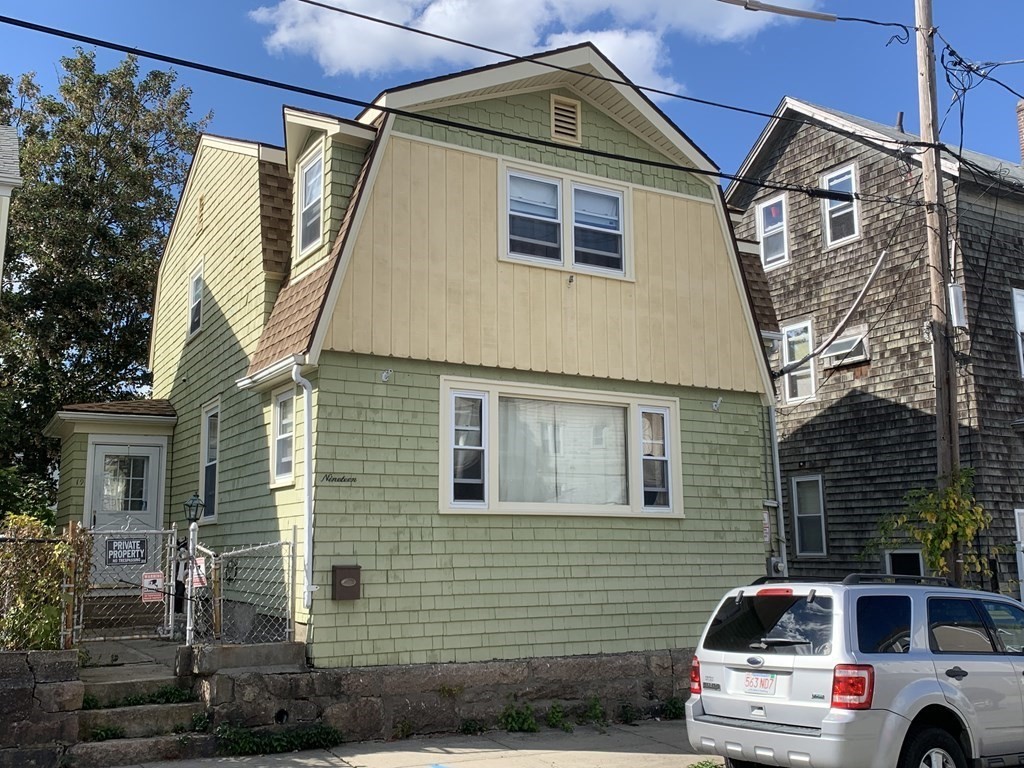 19 Beacon Street Fall River, MA 02721 - Photo 1 of 33 a view of a car park in front of a house